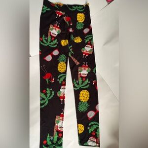 Vibrant Holiday Leggings with Santa and Pineapple Print